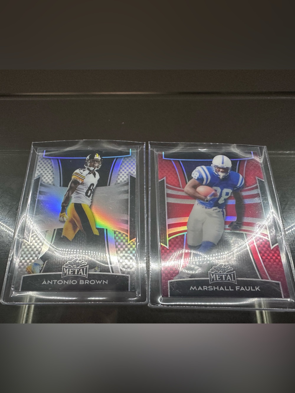 Antonio Brown 77/149 & Marshall Faulk 17/25